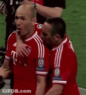 Two Soccer Players Are Hugging Each Other And One Has The Number 6 On His Shirt GIF