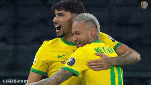 Two Soccer Players Are Hugging Each Other And One Of Them Has The Name Neymar On His Shirt GIF