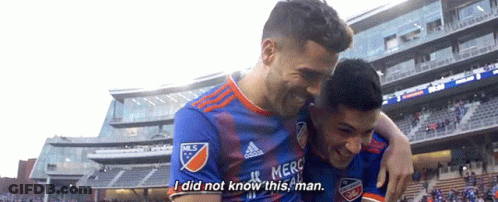 Two Soccer Players Are Hugging Each Other And One Of Them Is Saying " I Did Not Know This Man " GIF