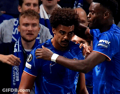 Two Soccer Players Are Hugging Each Other With One Wearing A Shirt That Says River GIF