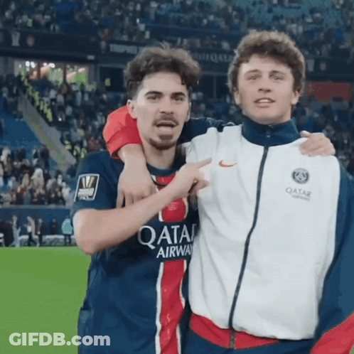 Two Soccer Players Are Posing For A Picture And One Has A Qatar Airways Jersey On GIF