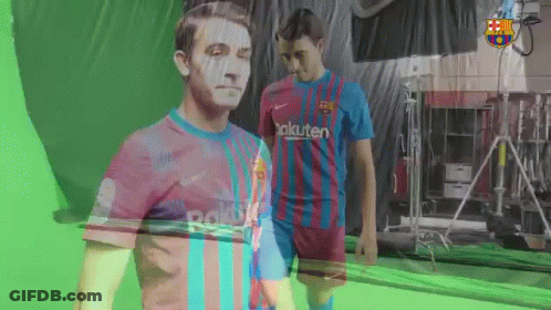 Two Soccer Players Are Standing In Front Of A Green Screen GIF