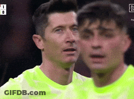 Two Soccer Players Are Standing Next To Each Other And One Of Them Has The Number 1 On His Shirt GIF
