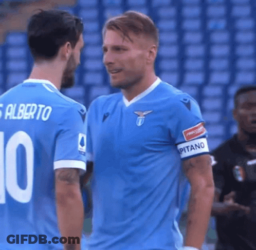 Two Soccer Players Are Standing Next To Each Other And One Of Them Has The Number 10 On His Shirt GIF