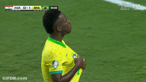 Two Soccer Players Celebrate Goal Brazil Vs Paraguay GIF