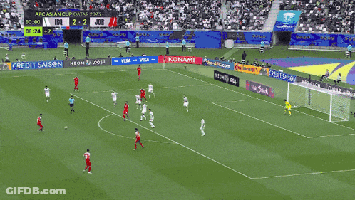 Two Soccer Players Celebrating Goal GIF