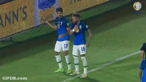 Two Soccer Players Celebrating Goal GIF