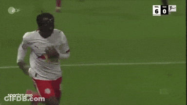 Two Soccer Players Celebrating Goal In Red Bull Jerseys GIF
