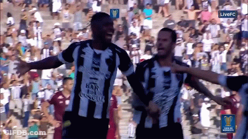 Two Soccer Players Celebrating Goal Live FC Logo GIF