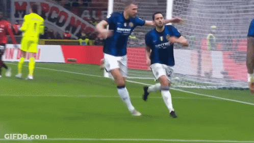 Two Soccer Players Celebrating Goal Marconi Banner GIF