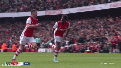 Two Soccer Players Celebrating Goal On BT Sport GIF