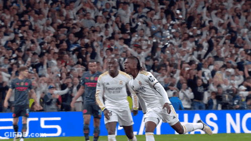 Two Soccer Players Celebrating Goal With EC5 Sign GIF