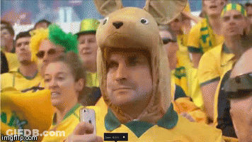 Two Soccer Players Celebrating Goal With Live FC Logo GIF