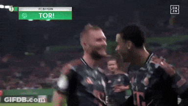 Two Soccer Players Dancing Under Mainz 05 Scoreboard GIF