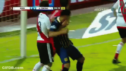 Two Soccer Players Fighting On Field GIF