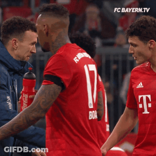 Two Soccer Players High Five FC Bayern.tv Advertisement GIF