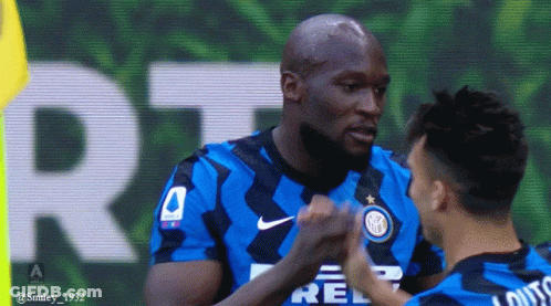 Two Soccer Players High Fiving GIF