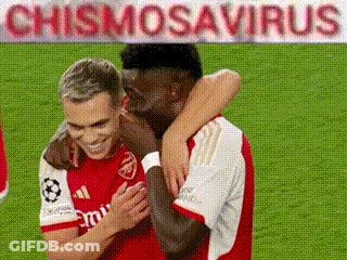 Two Soccer Players Hugging GIF