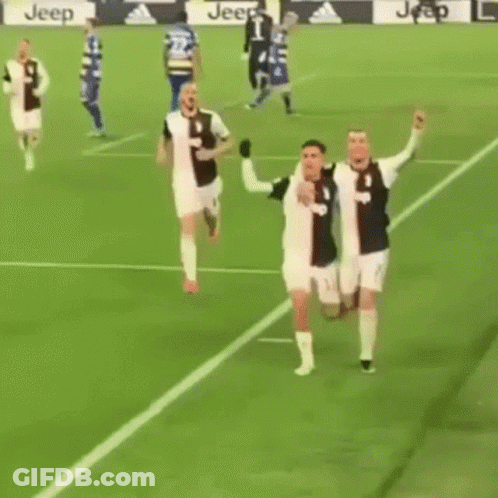 Two Soccer Players Hugging GIF