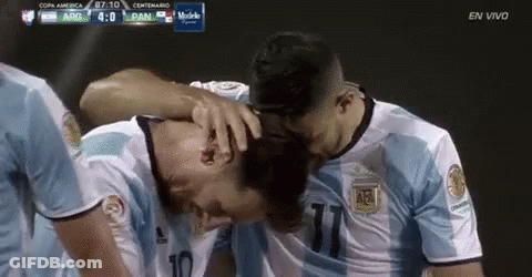 Two Soccer Players Hugging Argentina Vs Panama GIF