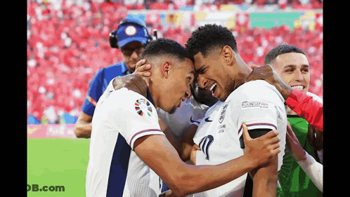 Two Soccer Players Hugging GIF