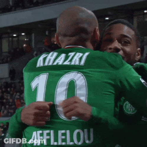 Two Soccer Players Hugging Number 10 GIF