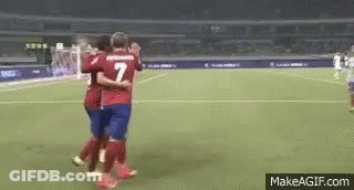 Two Soccer Players Hugging Number 7 GIF