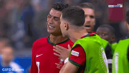 Two Soccer Players Hugging, One With Number 1 GIF