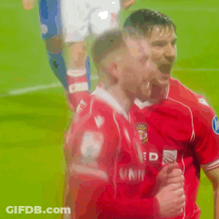 Two Soccer Players Hugging United Jersey GIF