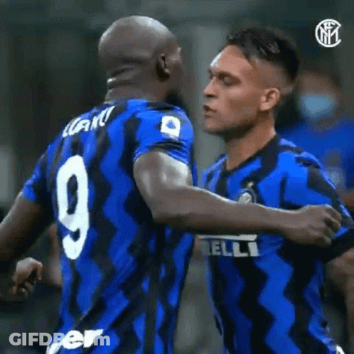 Two Soccer Players Hugging GIF