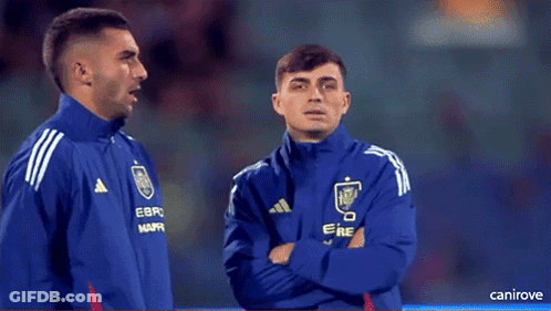 Two Soccer Players In Blue Adidas Jackets GIF