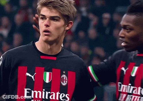 Two Soccer Players In Emirates Jerseys GIF