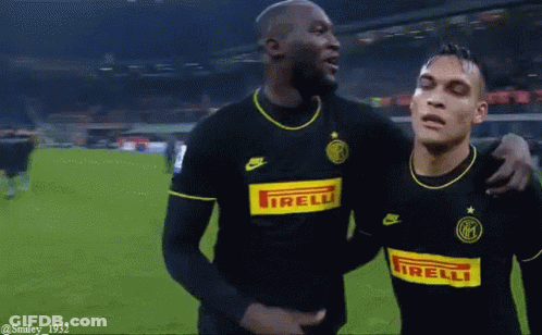 Two Soccer Players In Nike And Irelli Jerseys GIF