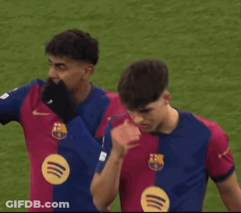 Two Soccer Players In Nike Jerseys On Field GIF