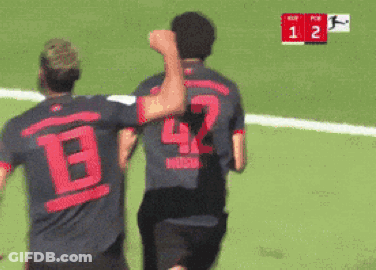 Two Soccer Players In Number 42 Jerseys GIF
