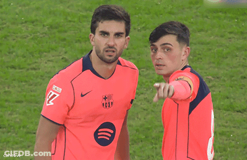 Two Soccer Players In Pink Spotify Jerseys GIF