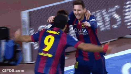 Two Soccer Players In Qatar Airways Jerseys Hugging GIF