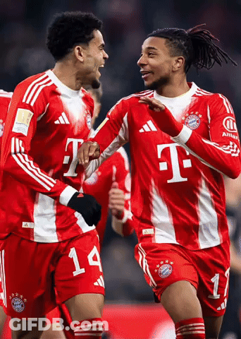 Two Soccer Players In Red And White T-Mobile Jerseys GIF