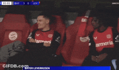Two Soccer Players In Red Armenia Jerseys GIF