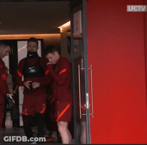 Two Soccer Players In Red AXA Jerseys GIF