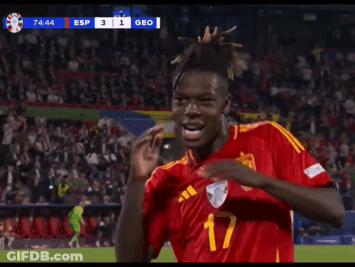 Two Soccer Players In Red Jerseys Number 17 GIF