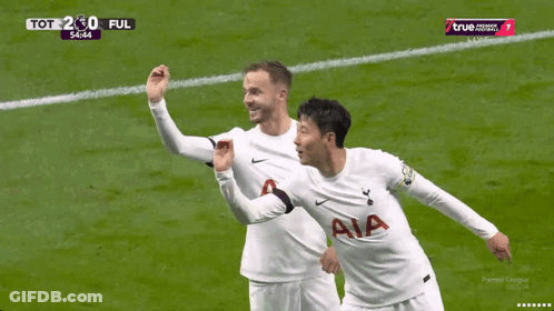 Two Soccer Players In White AIA Shirts GIF