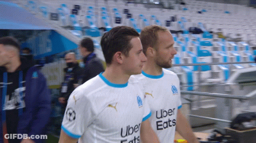 Two Soccer Players In White Jerseys GIF