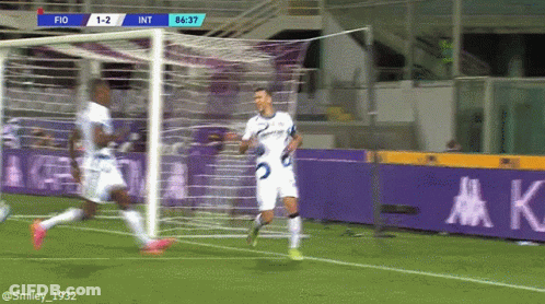 Two Soccer Players Kneeling One Number 30 GIF