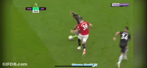 Two Soccer Players Laying On Field, One With Emirates GIF