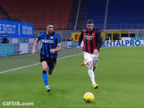 Two Soccer Players On A Field One Of Whom Is Wearing An Emirates Fly Better Jersey GIF