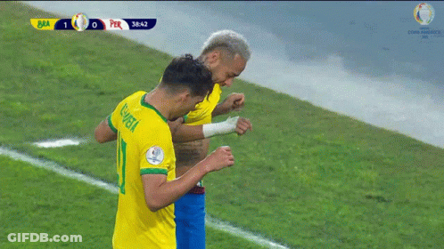 Two Soccer Players On A Field With A Score Of 1 To 0 In The Background GIF