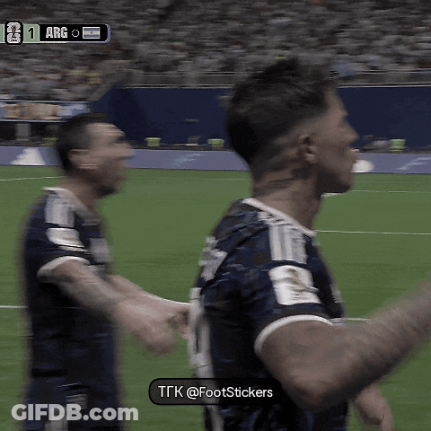 Two Soccer Players On A Field With A Scoreboard That Says Arg GIF