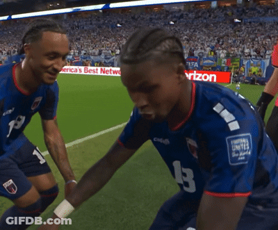 Two Soccer Players On A Field With A Sign That Says Best Network GIF