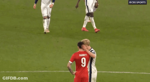 Two Soccer Players On A Field With One Wearing A Number 9 GIF